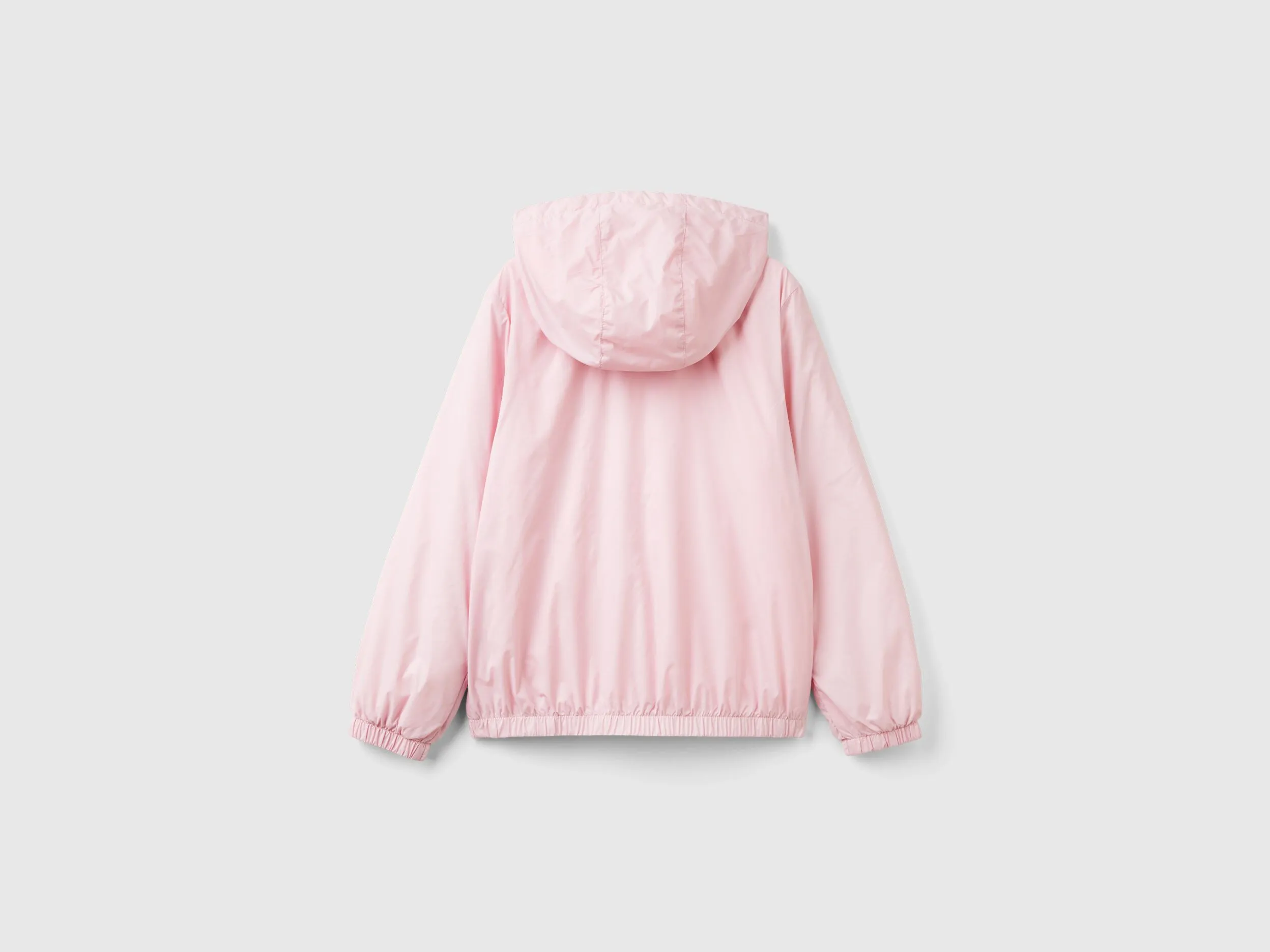 Glossy jacket with zip and hood - Pink | Benetton