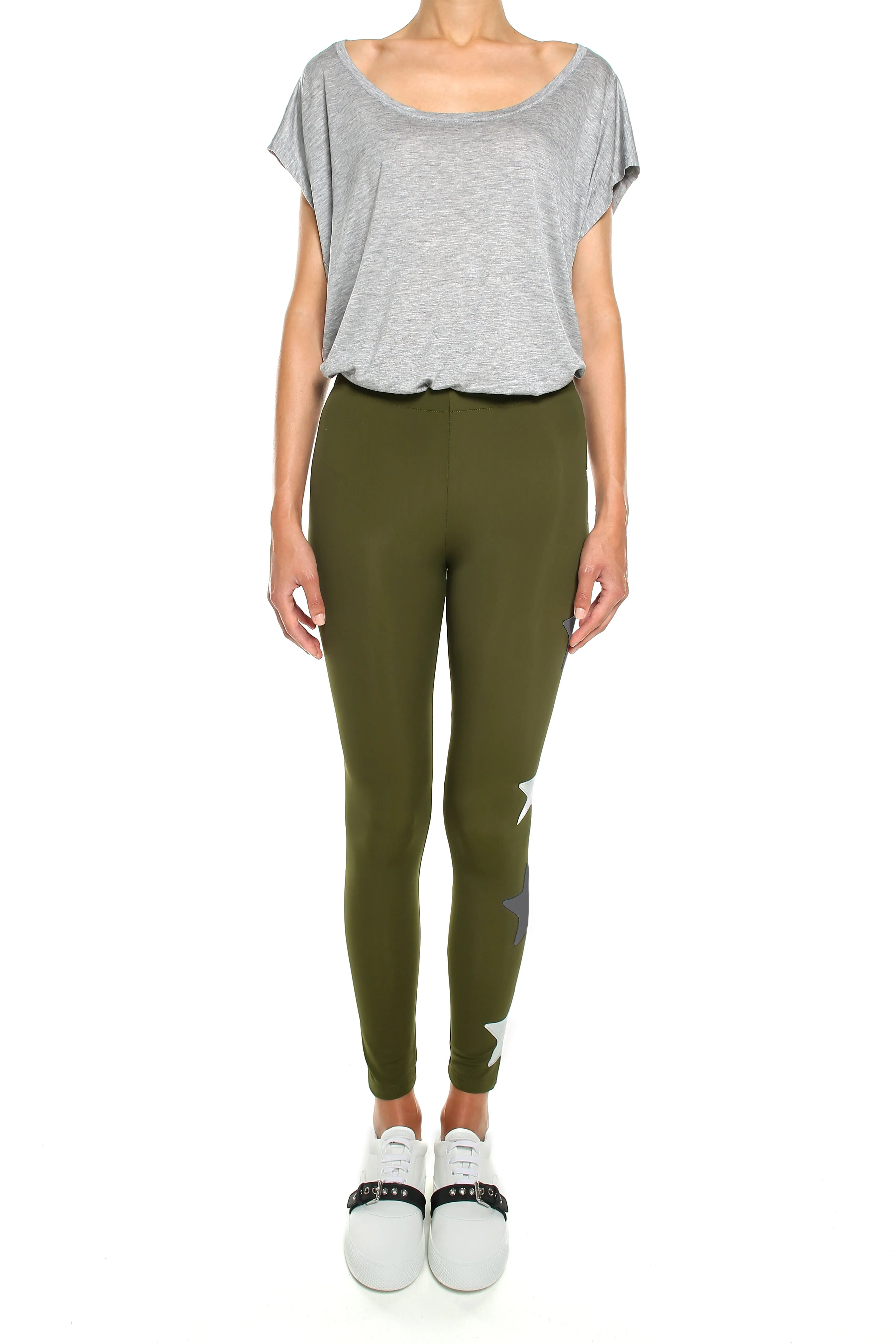 Leggings verde militare con stelle applicate