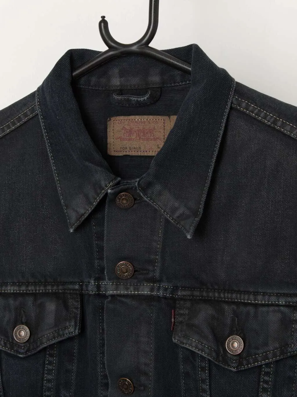 Vintage Levis women’s denim jacket in navy, overdyed – Medium