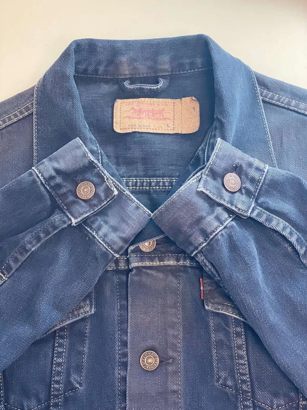 Vintage Levis women’s denim jacket in navy, overdyed – Medium